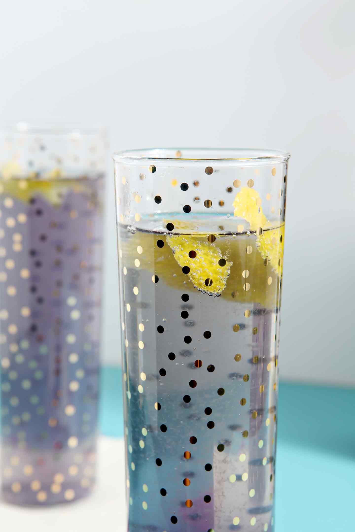 princess violette cocktail in a polka dot glass