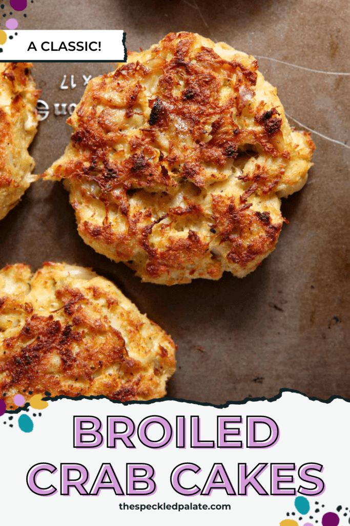 close up of crab cakes on a sheet pan with the text broiled crab cakes