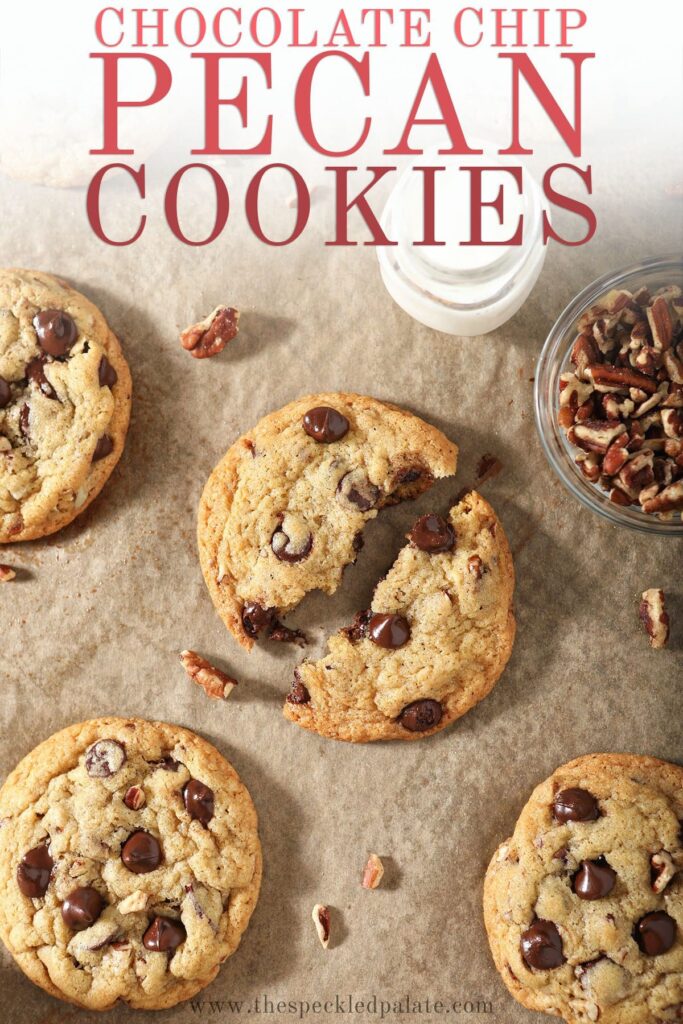 Cookies on a baking sheet with pecans with the text chocolate chip pecan cookies