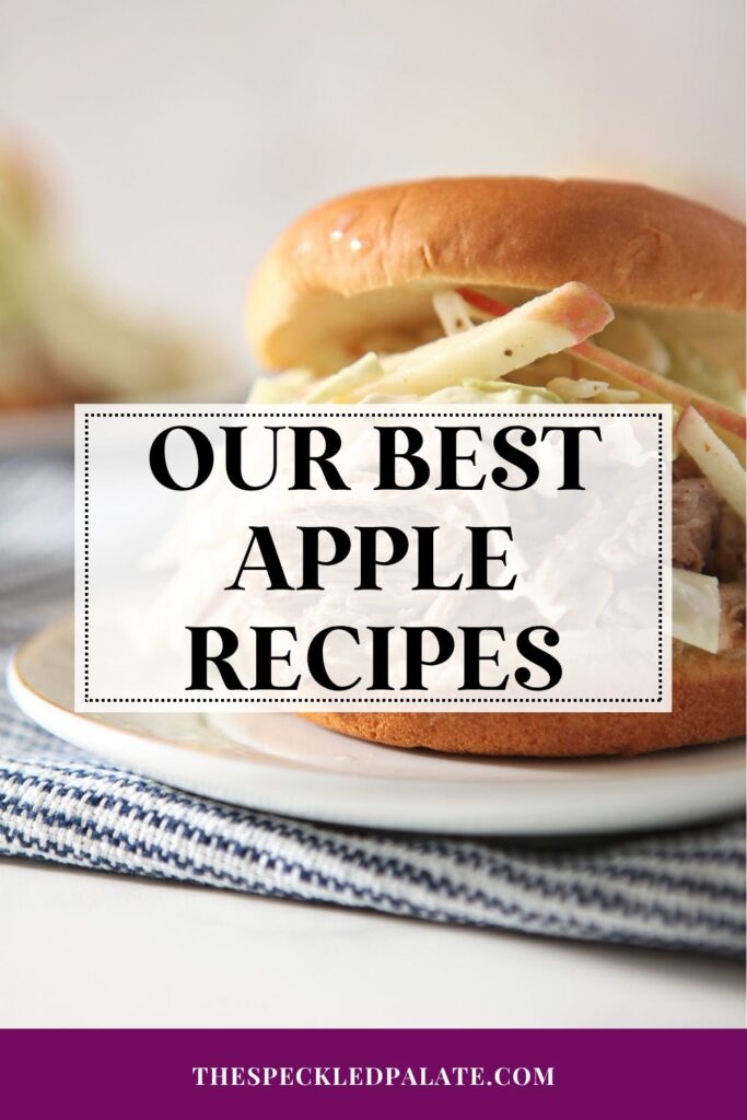 A pulled pork sandwich with an apple coleslaw on a plate with the text "Our Best Apple Recipes"