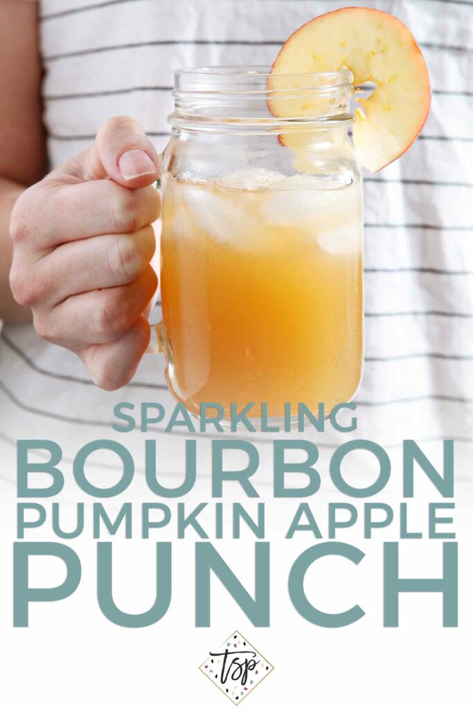 Pinterest graphic for Sparkling Bourbon Pumpkin Apple Punch, showing a woman holding a glass of the drink and text