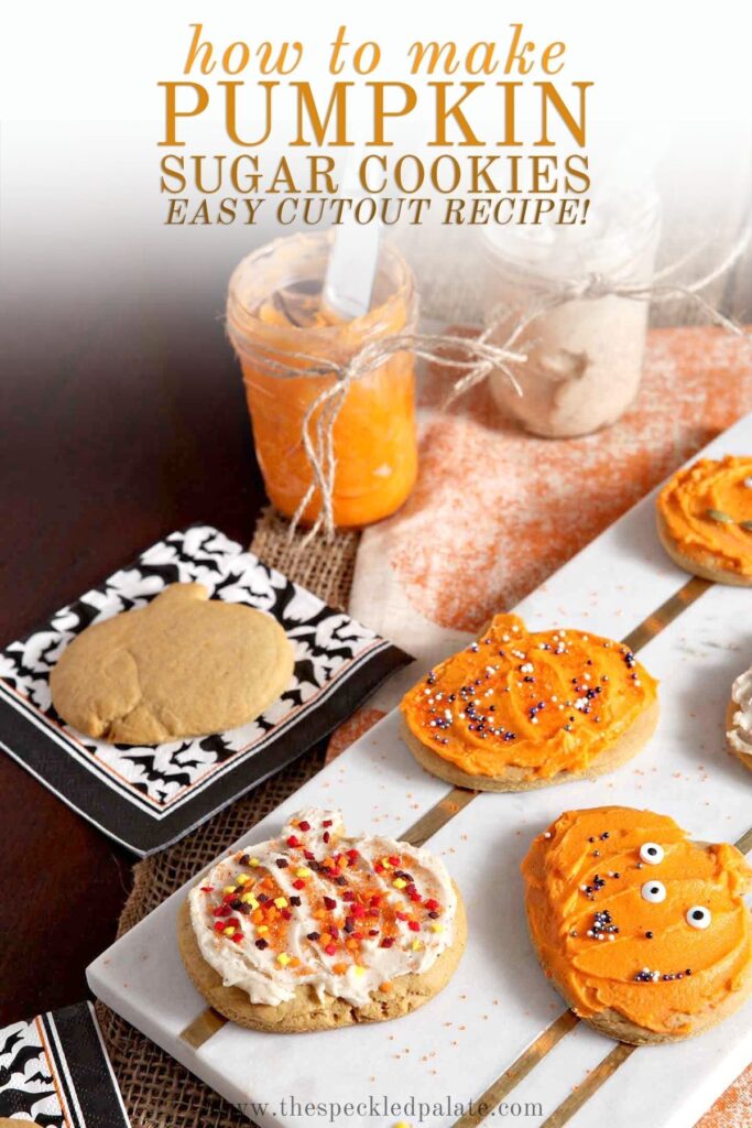 Decorated Pumpkin Sugar Cookies sit on a marble slab next to an undecorated cookie and jars of icing with the text 'how to make pumpkin sugar cookies easy cutout recipe!'