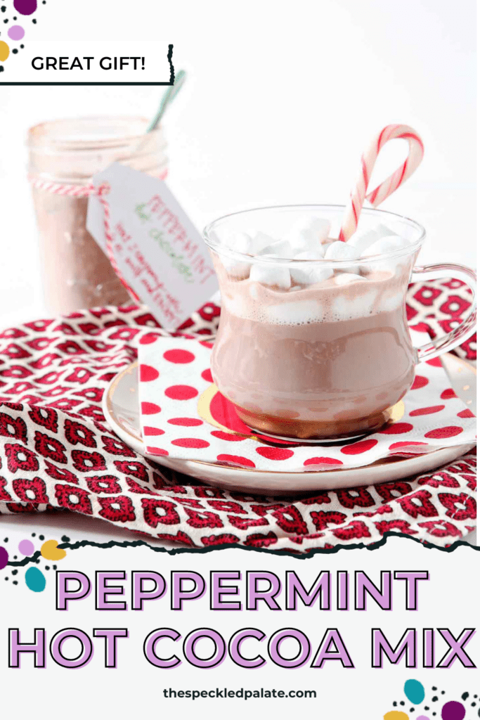 glass mug of hot cocoa with a candy cane and mini marshmallows with the text peppermint hot cocoa mix