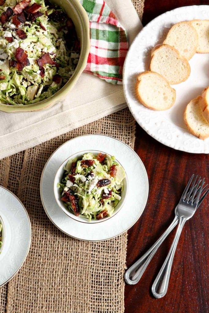 Cranberry Feta Brussels Sprout Salad with Candied Pecans and Warm Bacon Vinaigrette