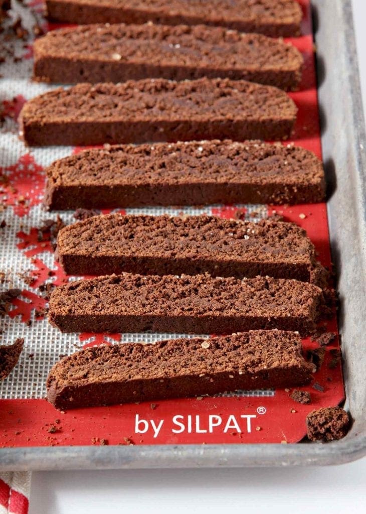 Sliced biscotti on Silpat on baking sheet 