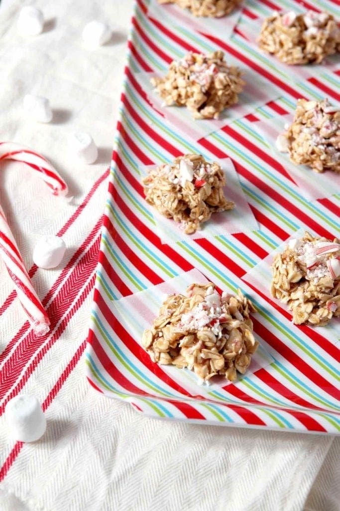 no bake peppermint bark cookies on a tray with candy canes