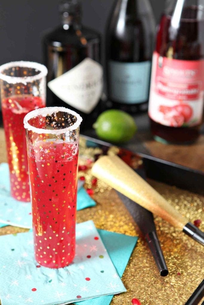 pomegranate french 75 in glasses