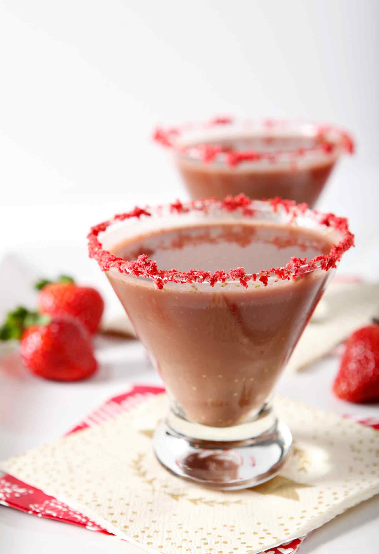 Two glasses of Chocolate Covered Strawberry Martinis