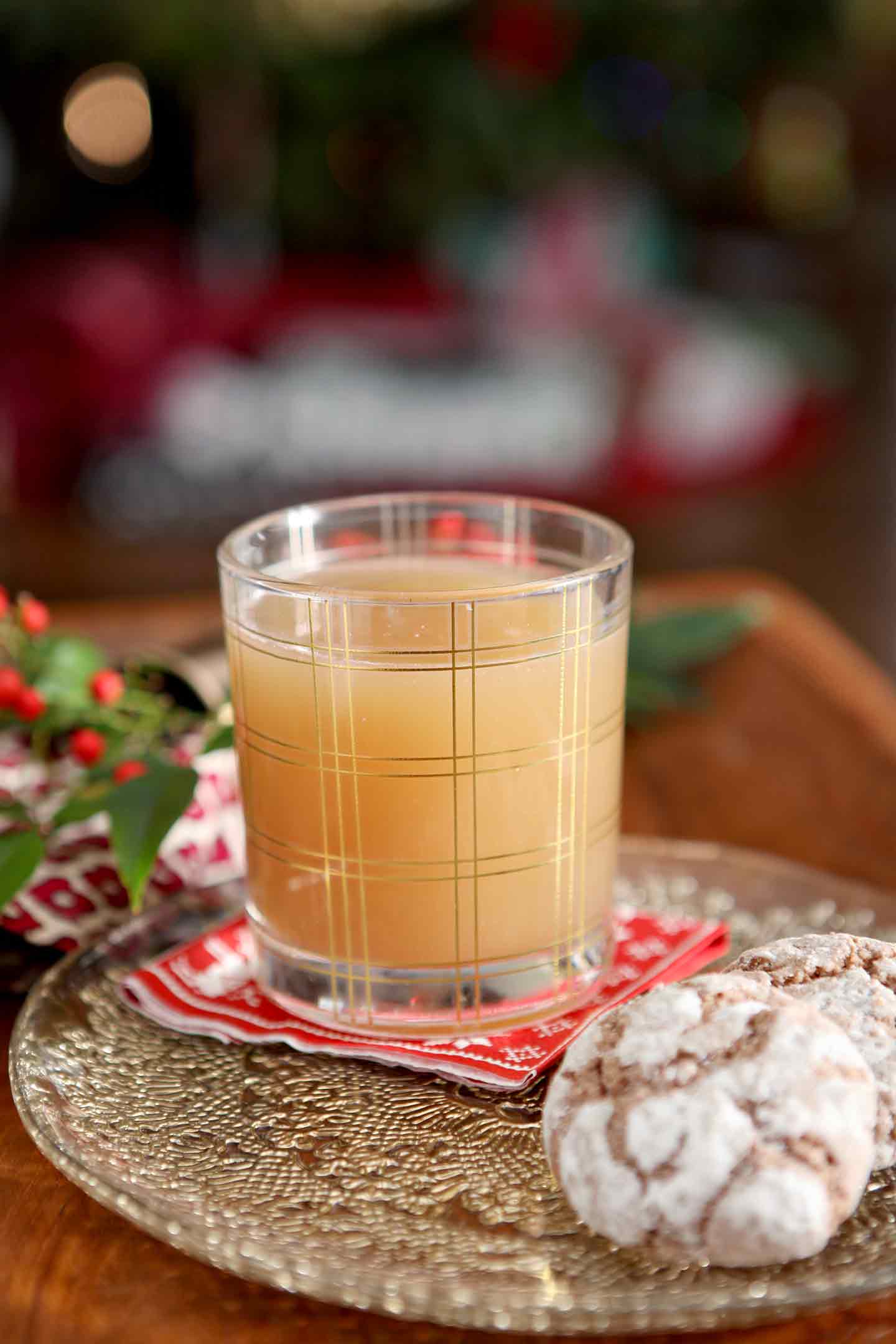 A close up of a glass of vegan bourbon pecan milk