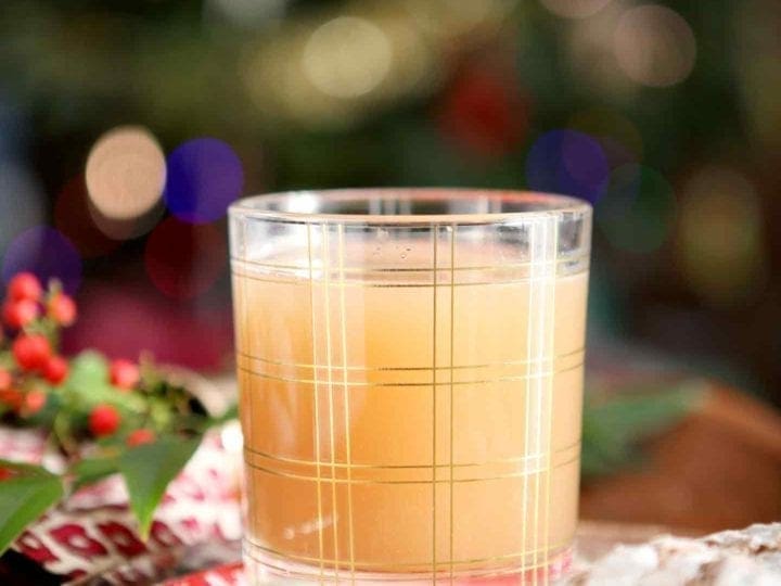 vegan bourbon pecan milk in a glass with cookies
