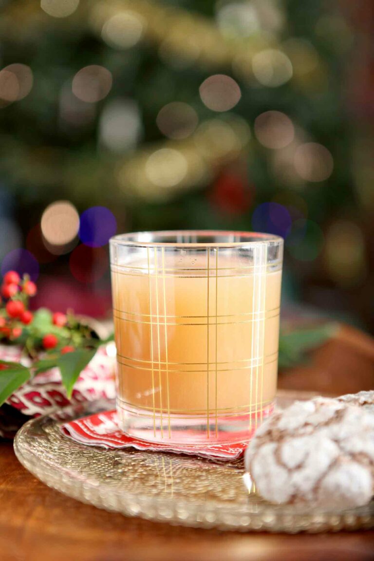 vegan bourbon pecan milk in a glass with cookies
