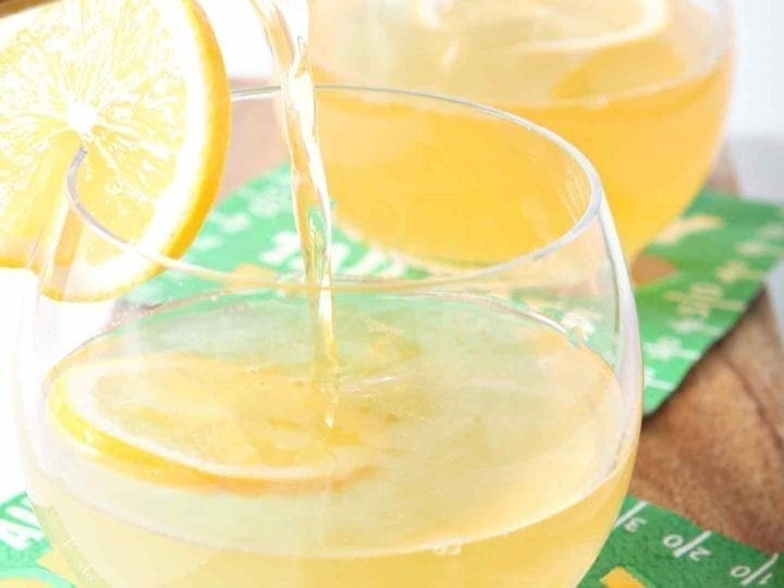 meyer lemon shandy in glasses with lemon wedges