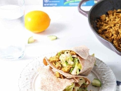 Turkey Shawarma Wrap cut in half on white plate