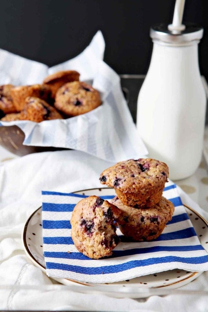 Lemon Blueberry Muffins on blue and white napkin 