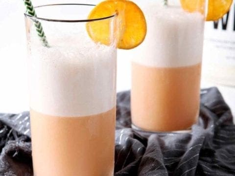 winter citrus smoothie in glasses with orange slices