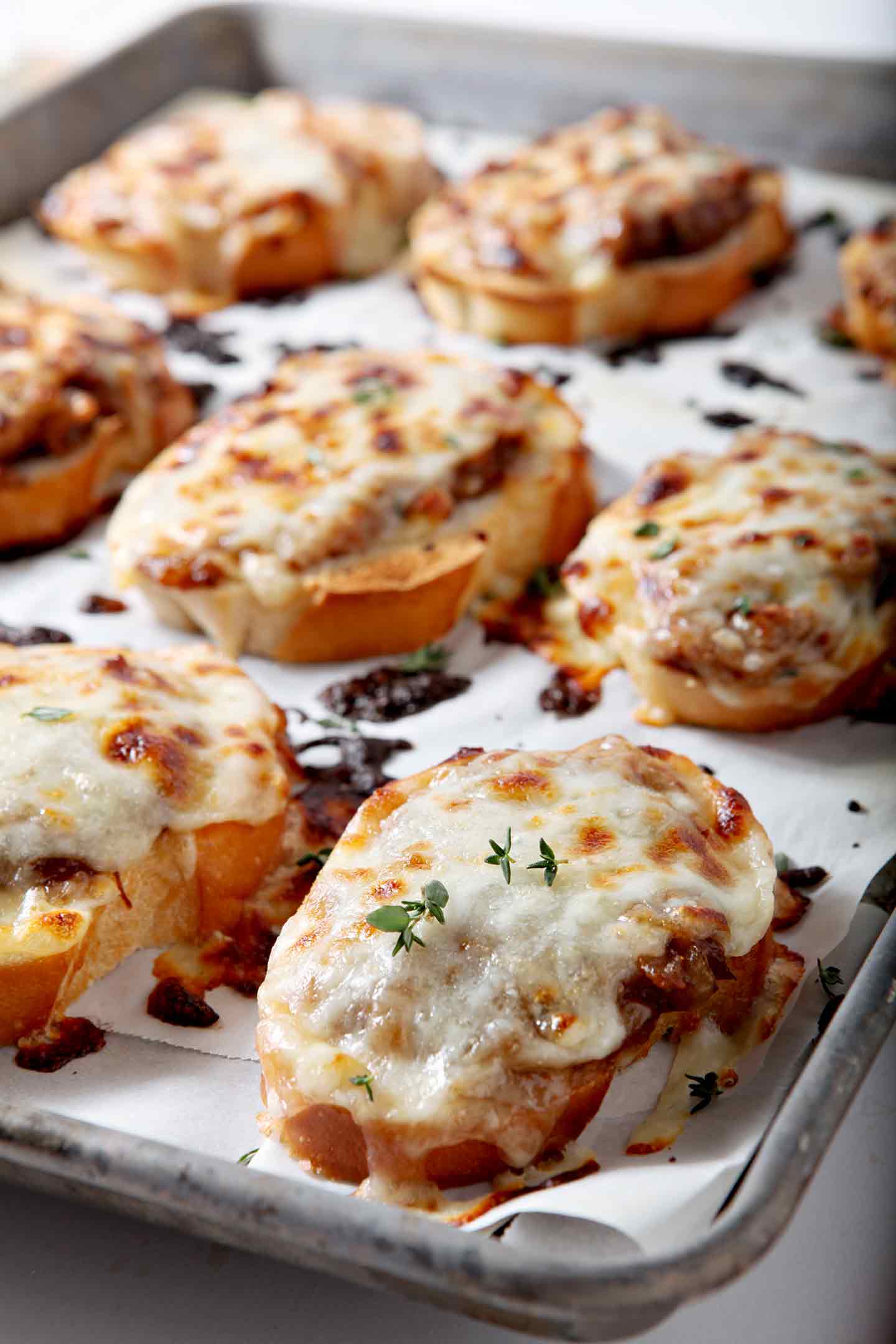 Close up of melted cheese on Bruschetta