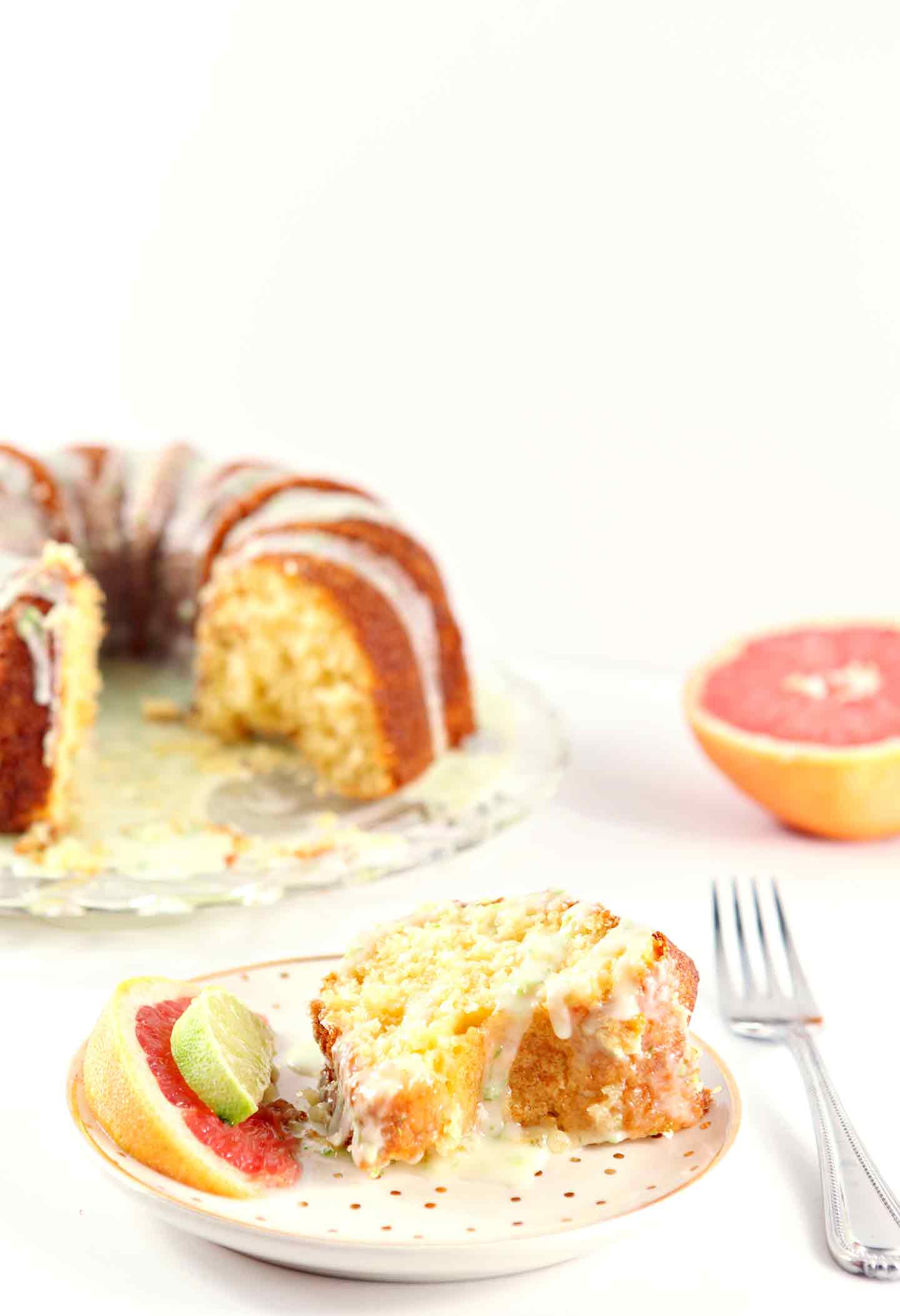 paloma citrus cake on a plate with a fork