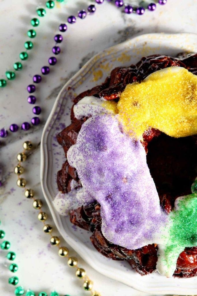 Close up of the sugar decorations on an easy king cake recipe involving cinnamon rolls