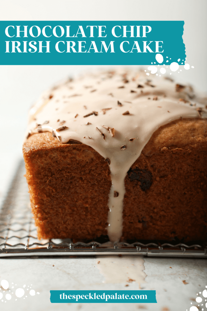 Icing drizzles down a loaf cake topped with chocolate shavings with the text chocolate chip irish cream cake