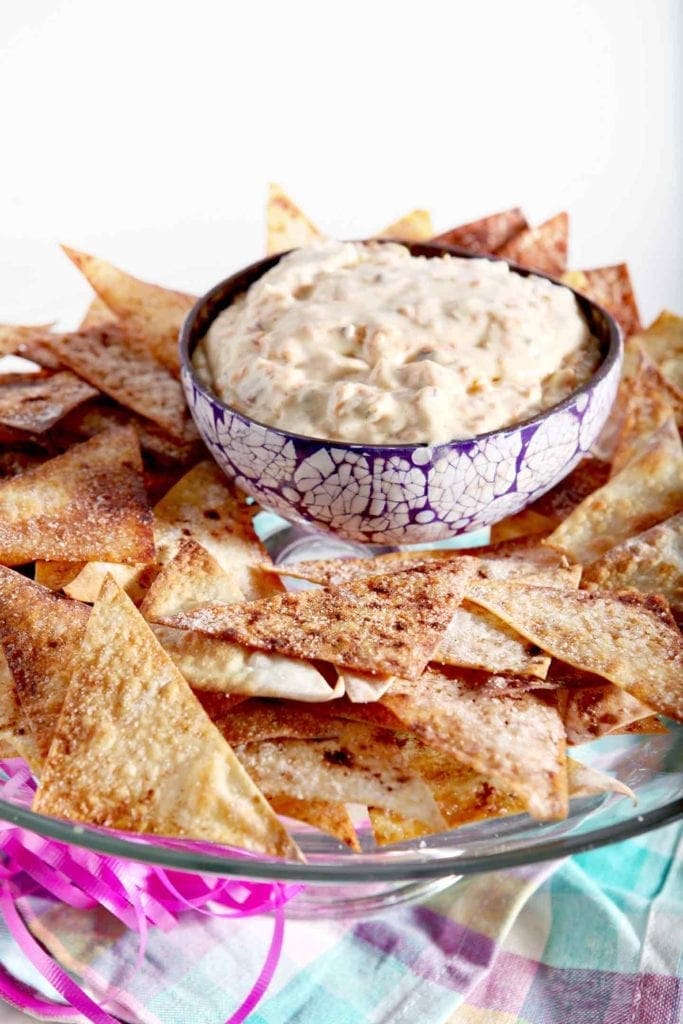 carrot cake dip in a bowl with wonton chips