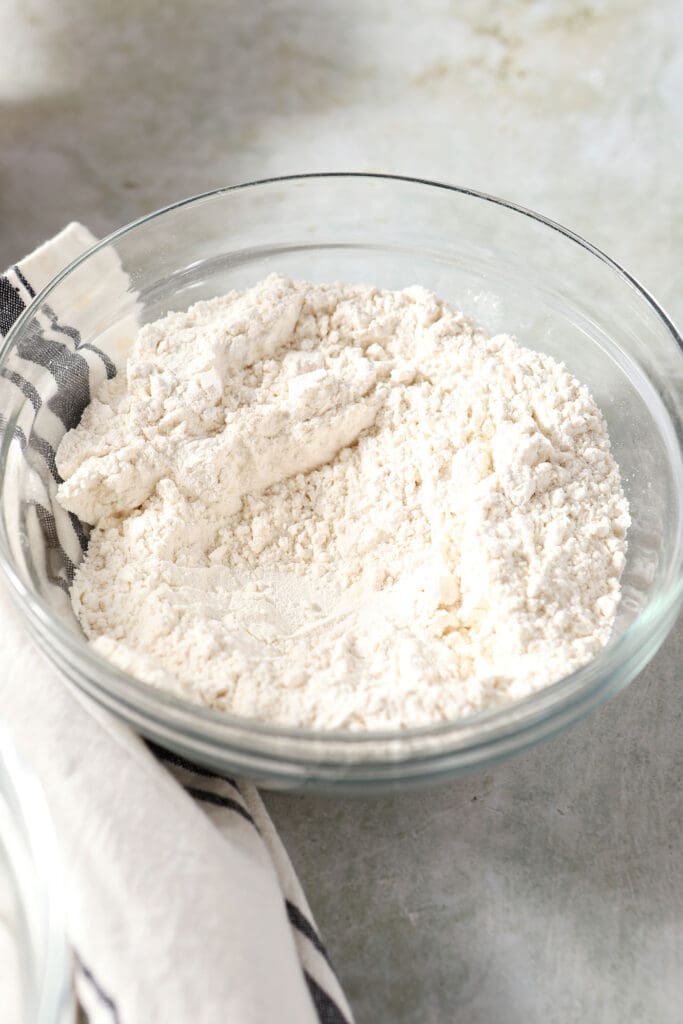 Dry ingredients in a bowl on a green countertop