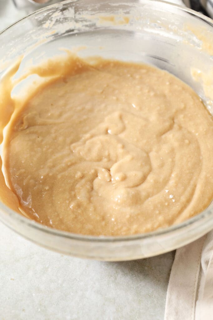 Irish cream cake batter in a bowl on a green countertop