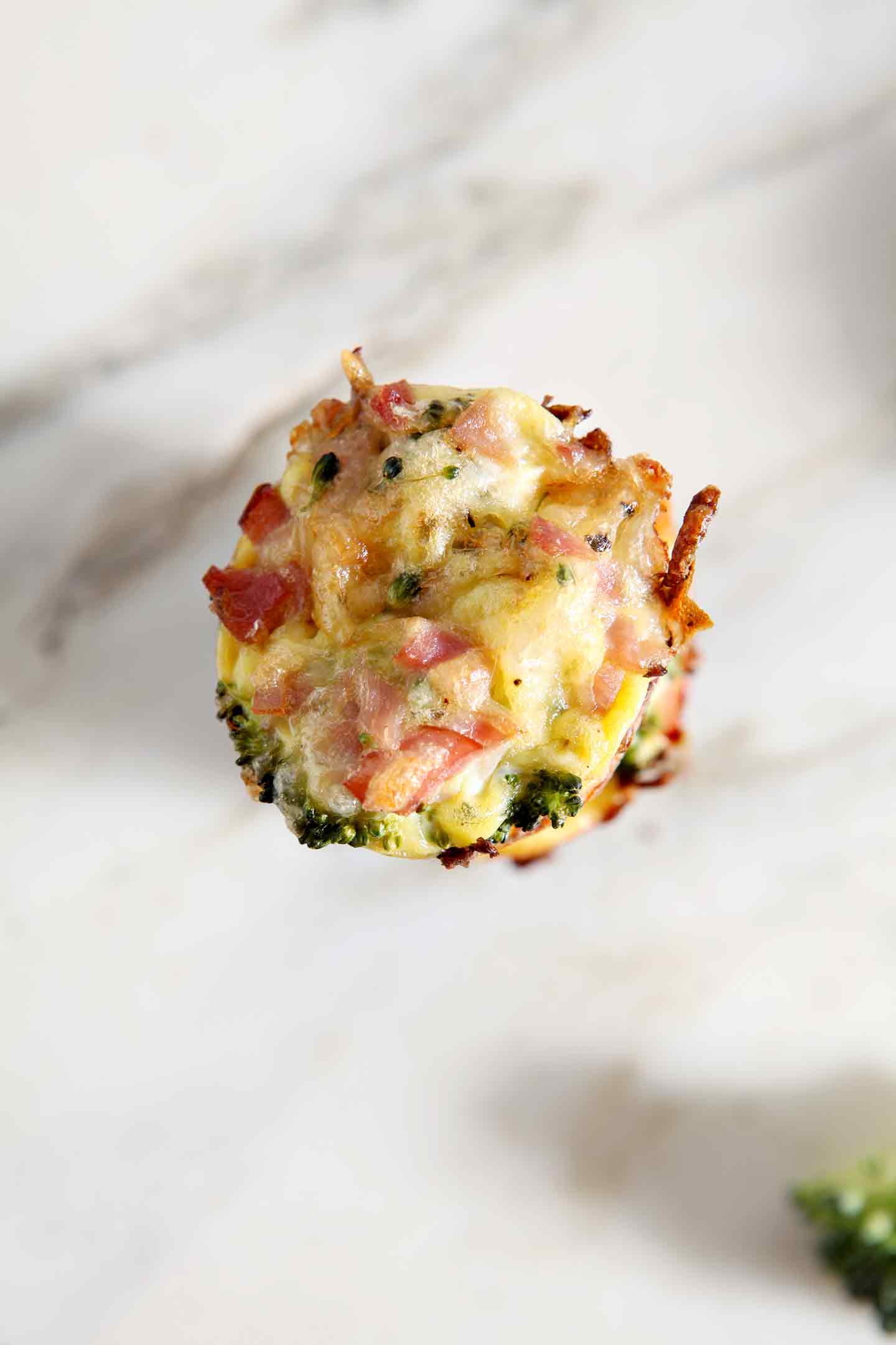 https://www.thespeckledpalate.com/wp-content/uploads/2017/04/The-Speckled-Palate-Gluten-Free-Broccoli-Quiche-Lorraine-Bites-Photos-Close-Up.jpg