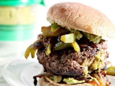 stuffed fajita burger on a white plate