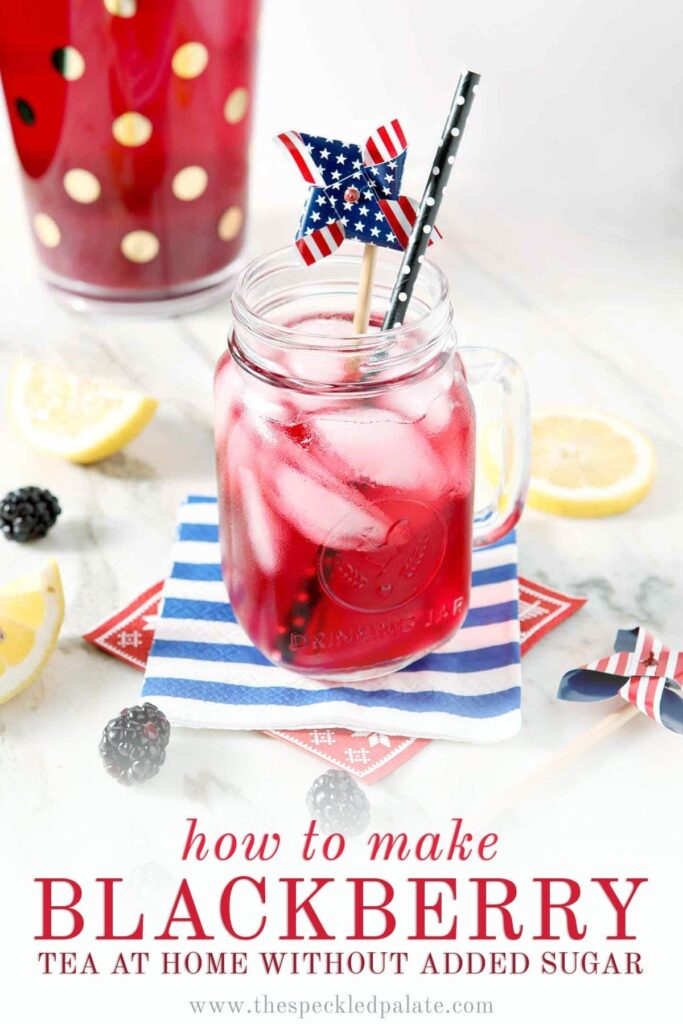 A mason jar holds a serving of blackberry tea with ice cubes and a patriotic pinwheel garnish with the text 'how to make blackberry tea without added sugar'