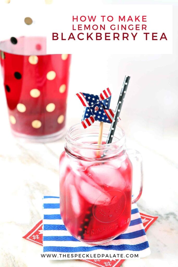 A mason jar holds a serving of blackberry tea with ice cubes and a patriotic pinwheel garnish with the text 'how to make lemon ginger blackberry tea'