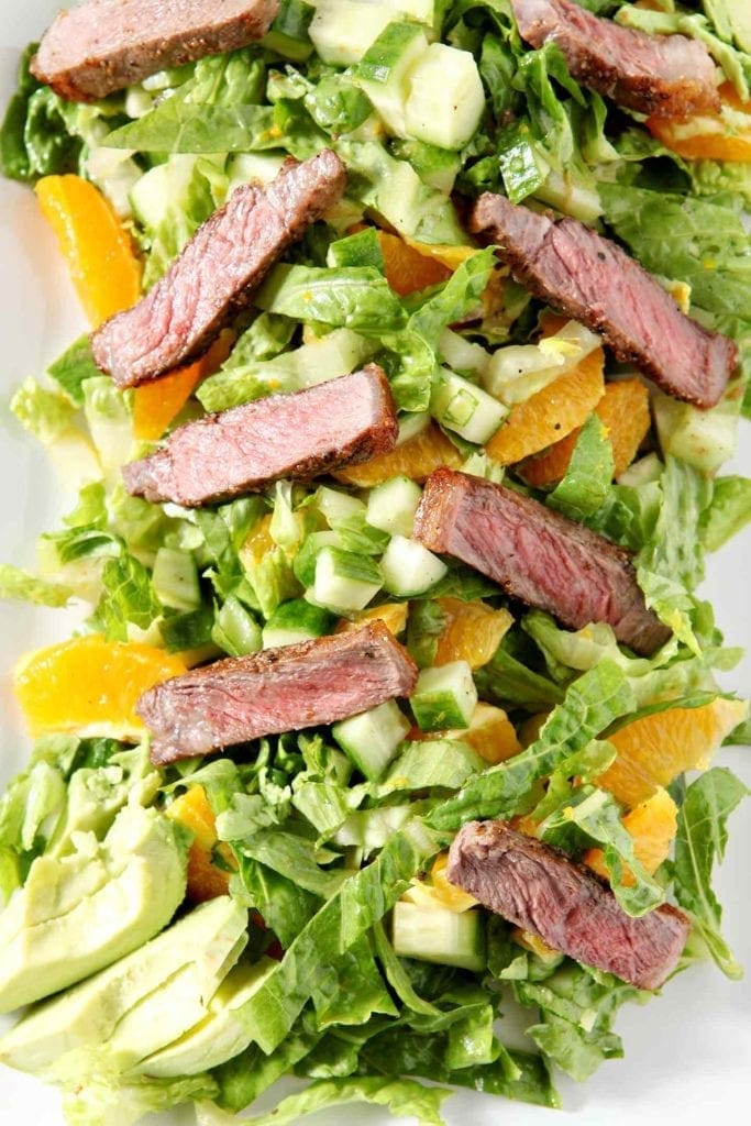 close up of orange steak salad