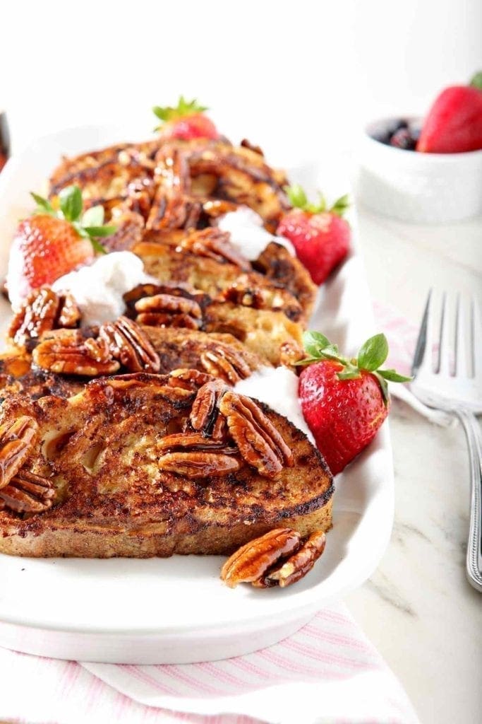 praline french toast on a white tray