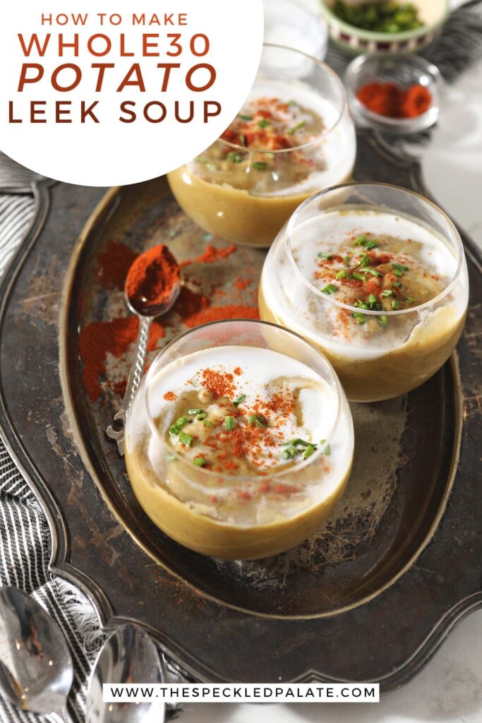 Three glass bowls hold potato leek soup on a silver tray with the text 'how to make whole30 potato leek soup'