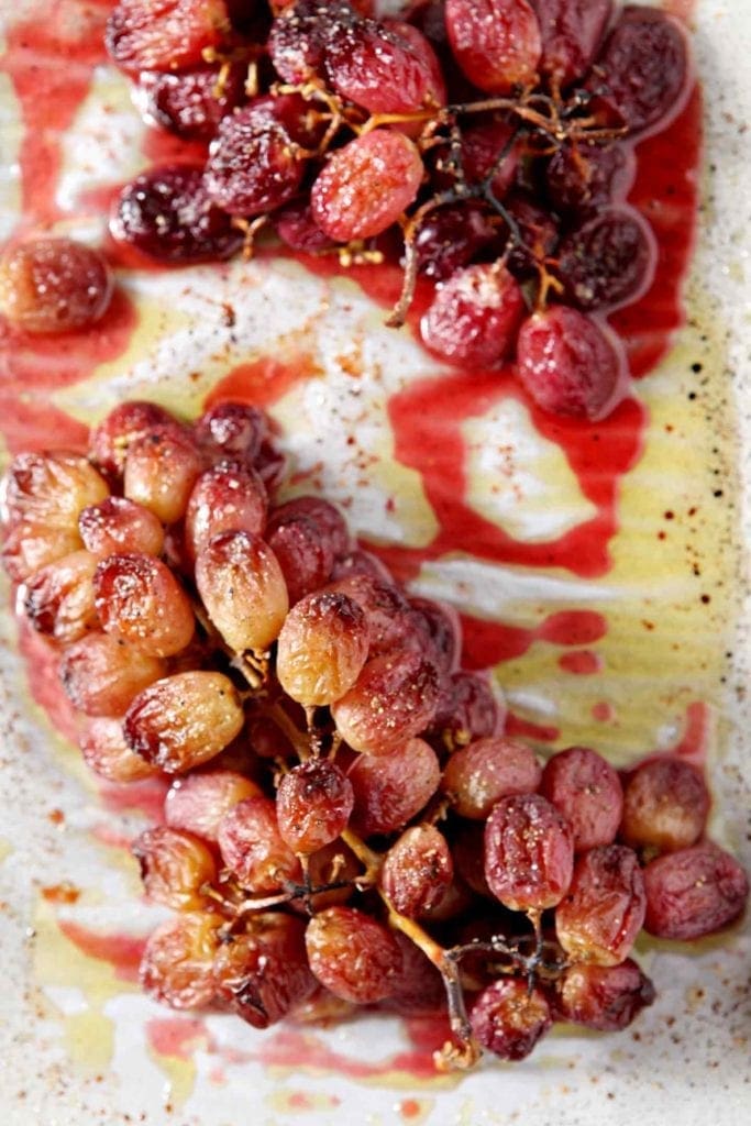 roasted grapes in a baking dish