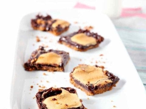 mint smores bars on a white tray