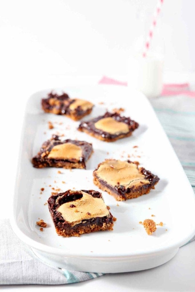 mint smores bars on a white tray