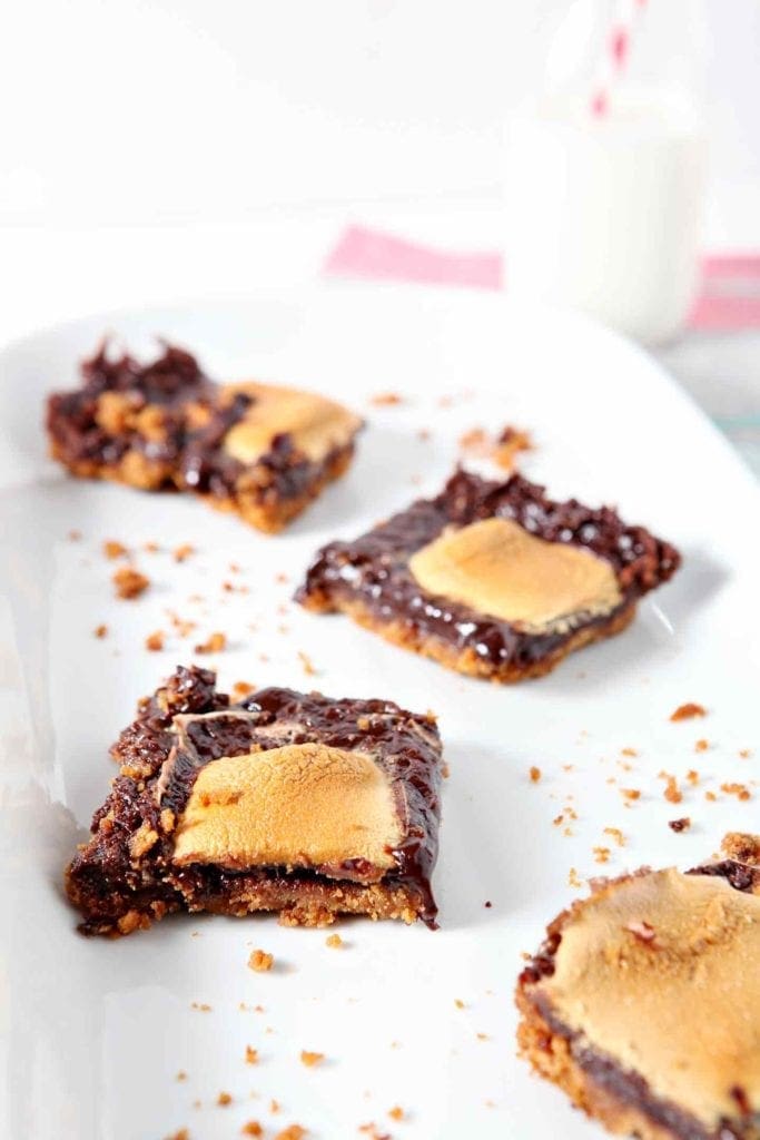 mint smores bars on a white tray