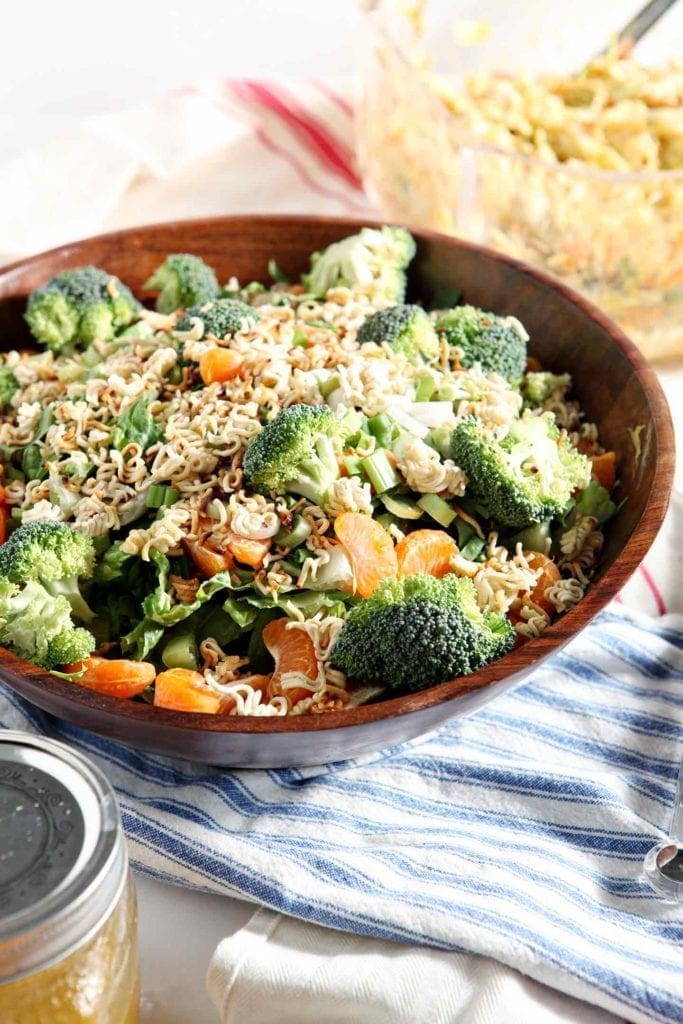 ramen noodle clementine salad in a wooden bowl