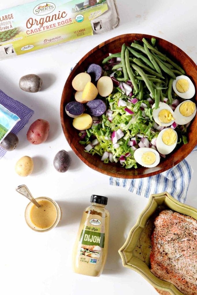 nicoise salad in a large mixing bowl