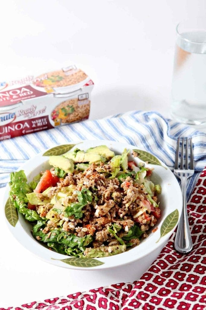 quinoa salad with a blue striped napkin