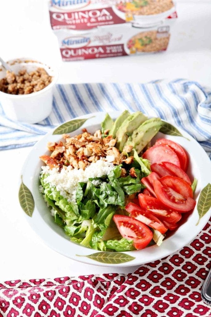 quinoa salad in a white bowl