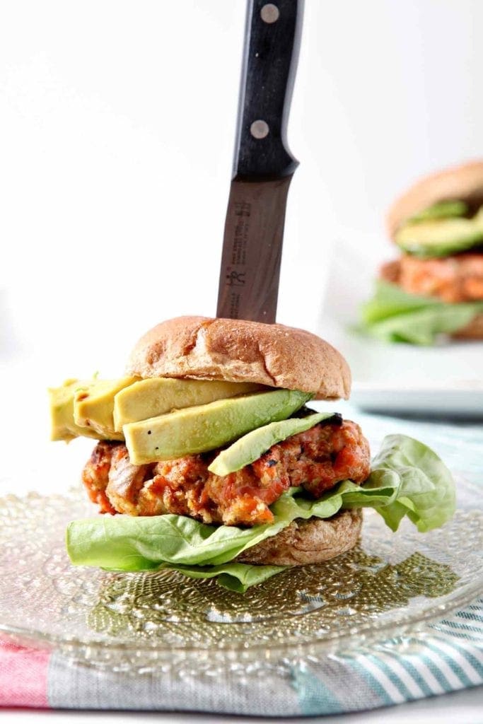 a knife in a salmon burger