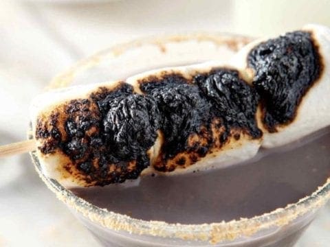 charred marshmallows on a martini