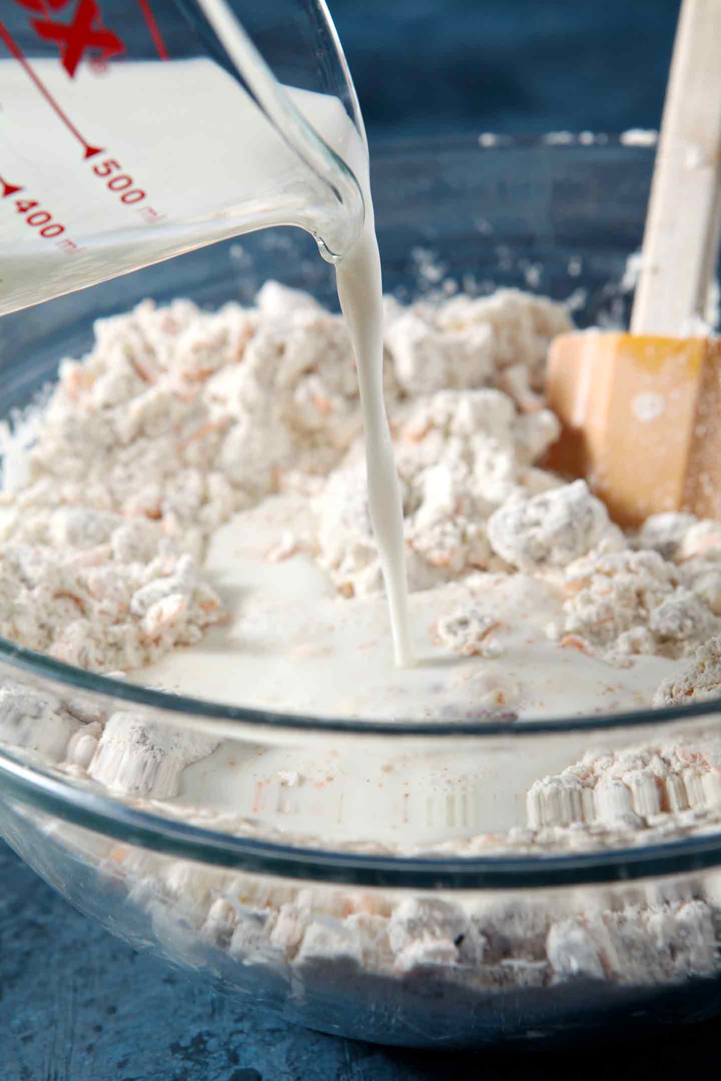 mixing ingredients in a glass bowl 