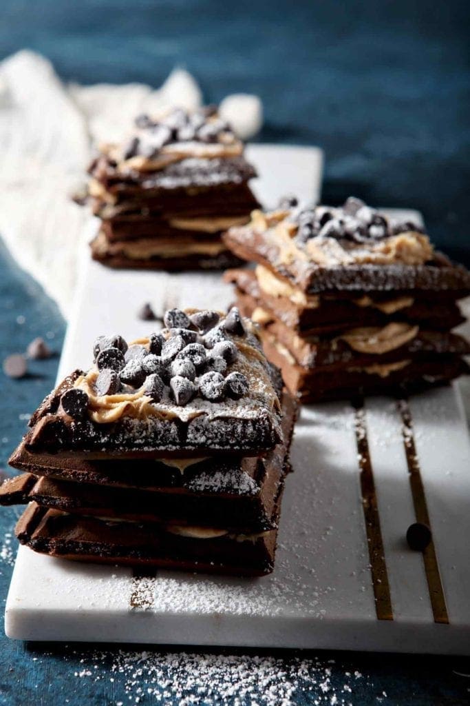 three peanut butter chocolate waffle sandwiches