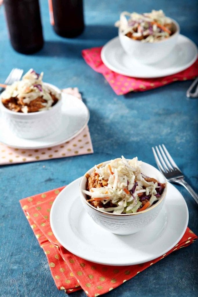 Three Pumpkin Pulled Pork Bowls are shown on a blue background