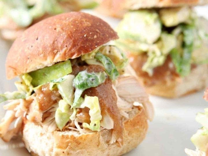 applesauce chicken sliders on a white plate