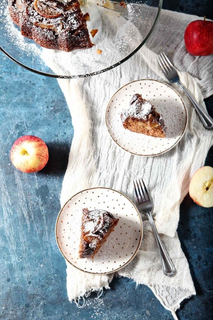 apple upside down cake on two white plates