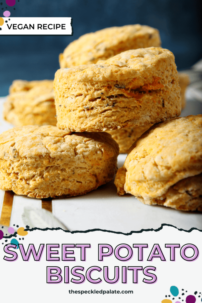 A stack of vegan biscuits on a marble platter with the text sweet potato biscuits