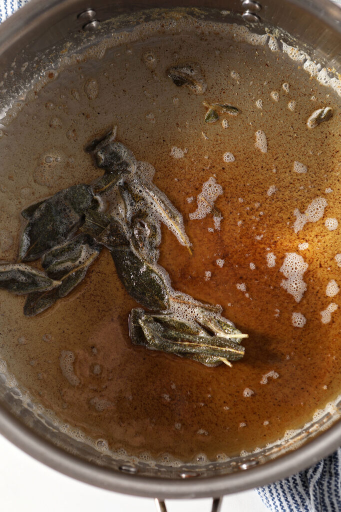 Browned butter with crispy sage leaves in a skillet